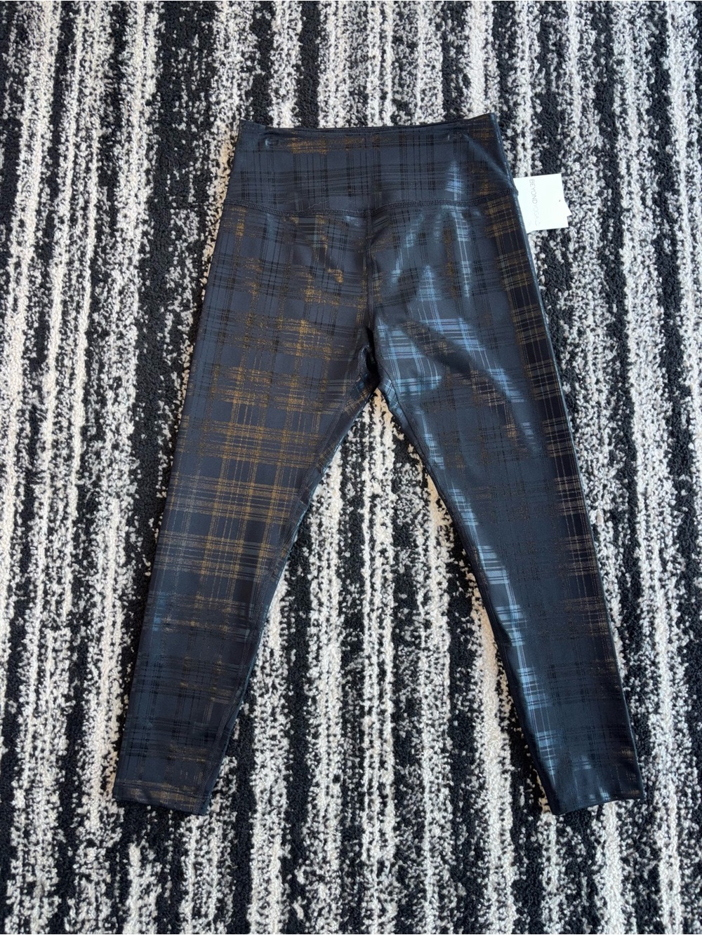 Beyond Yoga Black Plaid Leggings with Subtle Gold Sheen